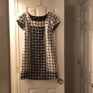 Short sleeve black and white dress.
